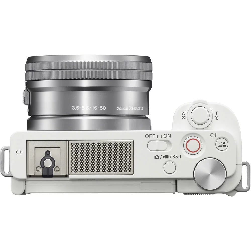 White Mirrorless Camera with 16-50mm Lens Q243195