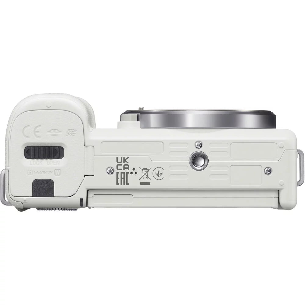 White Mirrorless Camera with 16-50mm Lens Q243195