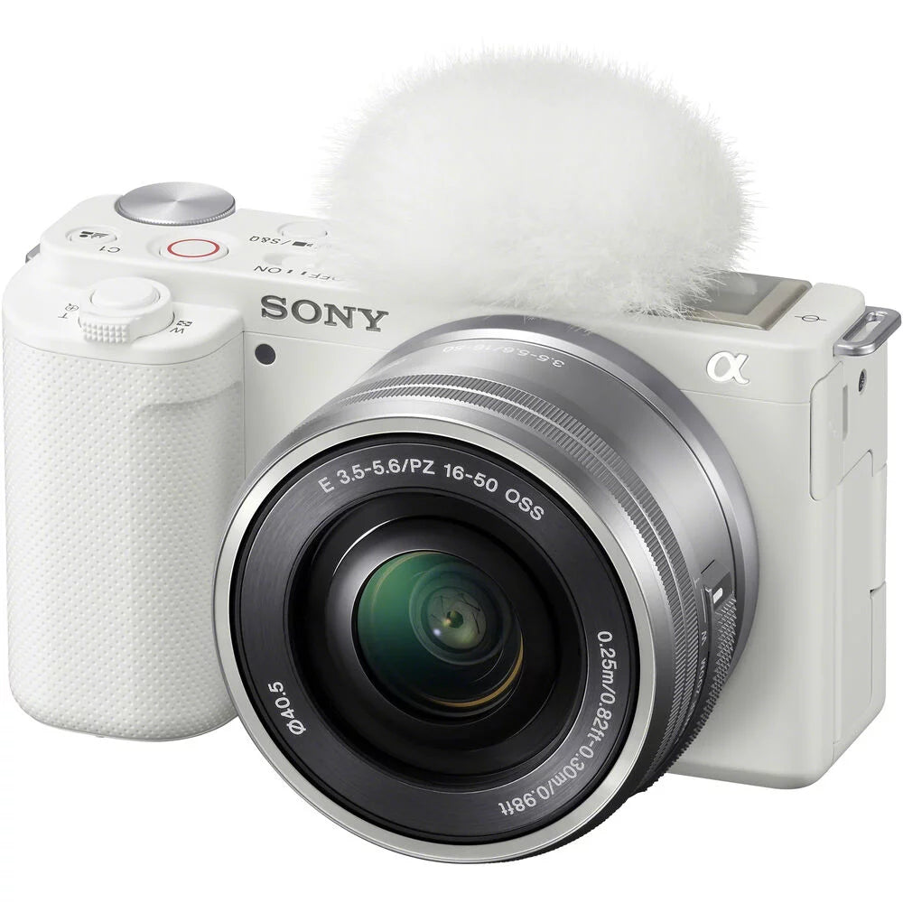 White Mirrorless Camera with 16-50mm Lens Q243195